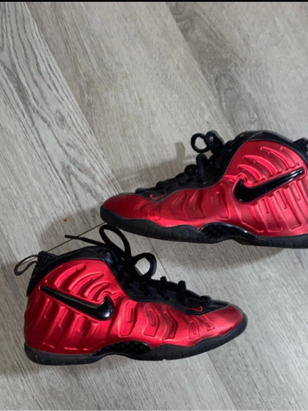 Size 3Y Nike Kids Red and Black Foamposite-Style Sneakers